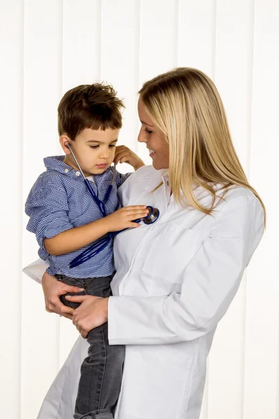 Doctor and young boy — Stock Photo, Image