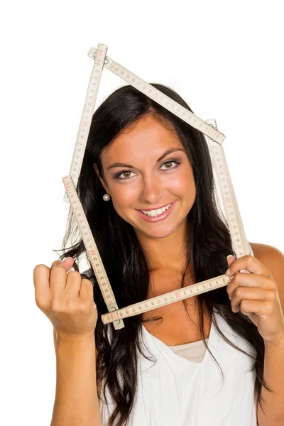 Junge Frau will ein Haus bauen — Stockfoto