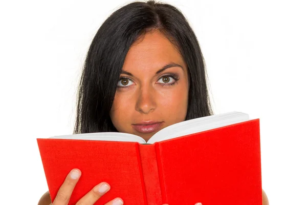 Egy nő könyvet olvas. — Stock Fotó