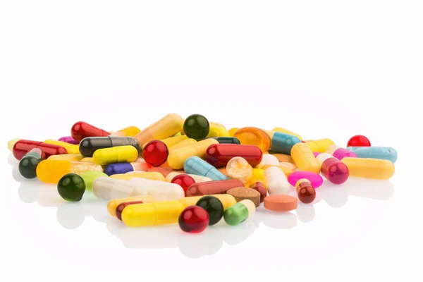 Muitas pílulas coloridas — Fotografia de Stock