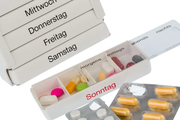 Ilaç makinesi ve tabletler — Stok fotoğraf