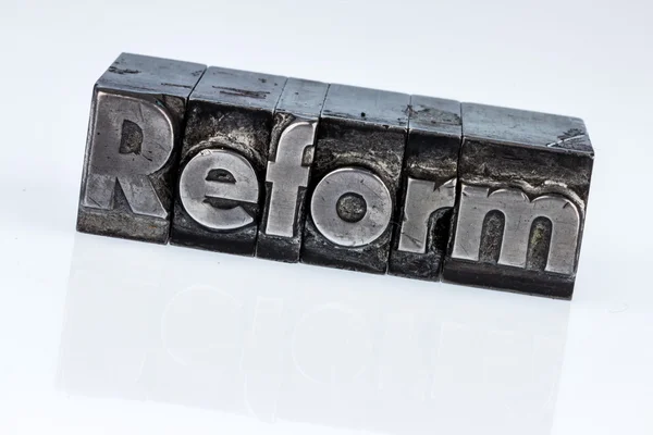 Written reform in lead letters — Stock Photo, Image