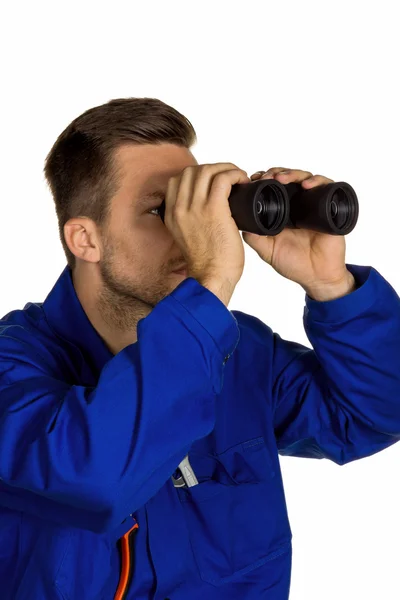 Craftsman with binoculars — Stock Photo, Image