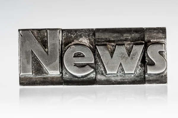 News in lead letters — Stock Photo, Image