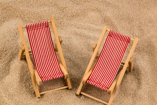 Deck chair on the sandy beach — Stock Photo, Image