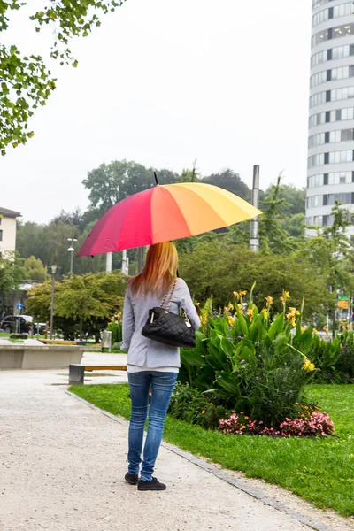 Woman with umbrella — Stock Photo, Image