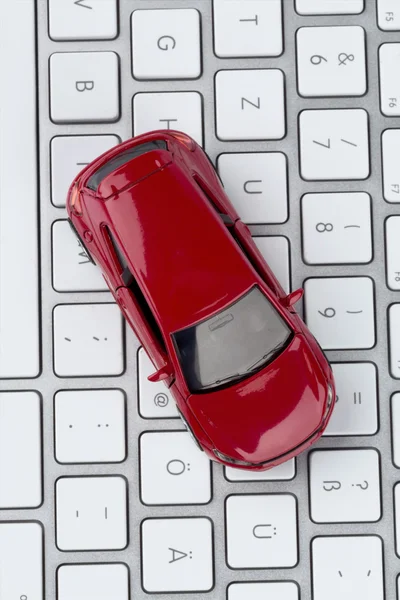 Car on computer keyboard — Stock Photo, Image