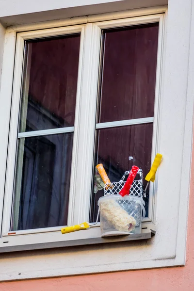 Art supplies in front of a window — Stock Photo, Image