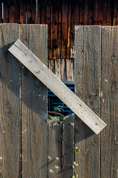 Schieten en oude houten hek — Stockfoto