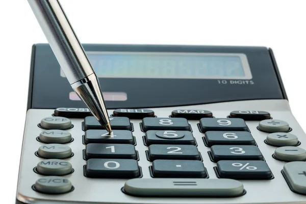 Caneta vermelha e calculadora — Fotografia de Stock