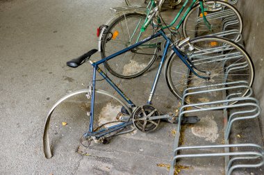 broken bike in the bike racks, clipart