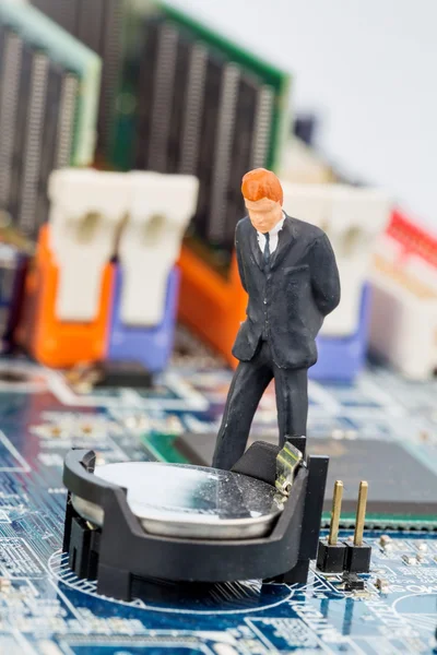 Manager on computer circuit board — Stock Photo, Image