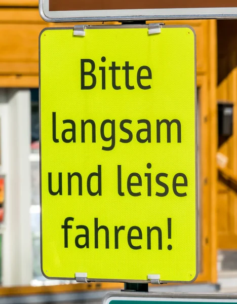 Drive slowly yellow sign — Stock Photo, Image