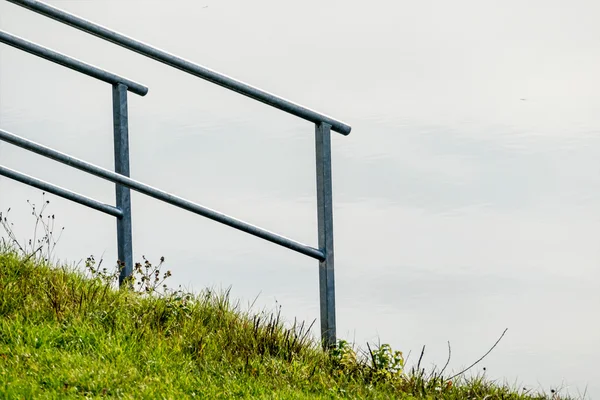 Railing on the shore — Stock Photo, Image