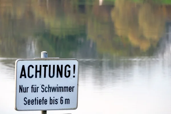 Warning sign for swimmers — Stock Photo, Image