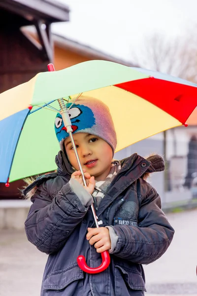 Child with umbrella — Stock Photo, Image