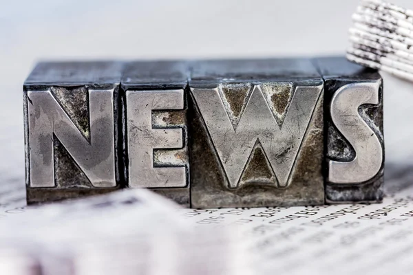 News in lead letters — Stock Photo, Image