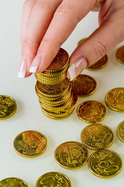 Salvar a la mujer con pila de monedas en dinero —  Fotos de Stock