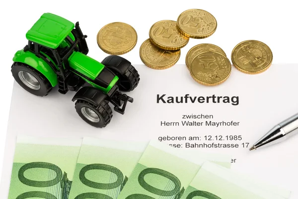 Purchase contract for new tractor — Stock Photo, Image