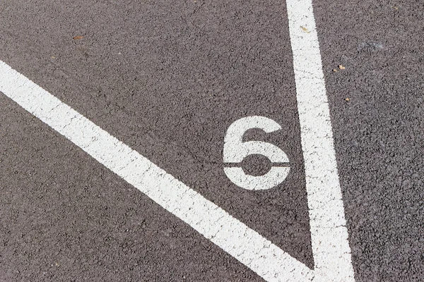 Getallen in een parkeerplaats — Stockfoto