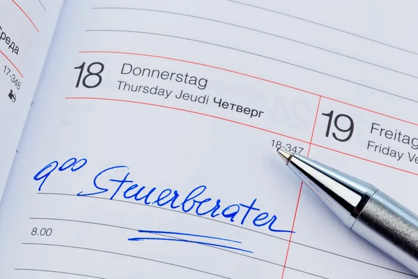 Eintrag im Kalender: Steuerberater — Stockfoto