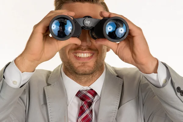 Manager with binoculars — Stock Photo, Image