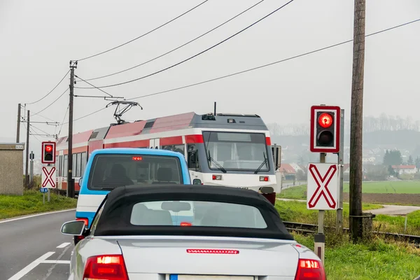 Cars on a railroad crossing — Stockfoto