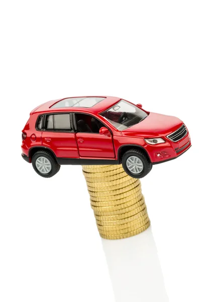 Rising car costs. car on coins — Stock Photo, Image