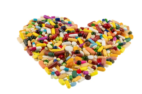 Színes tabletták a szív alakú — Stock Fotó