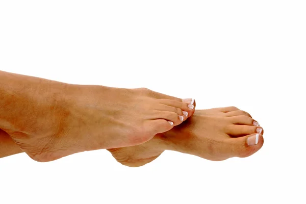 Legs of a woman in front of a white background — Stock Photo, Image