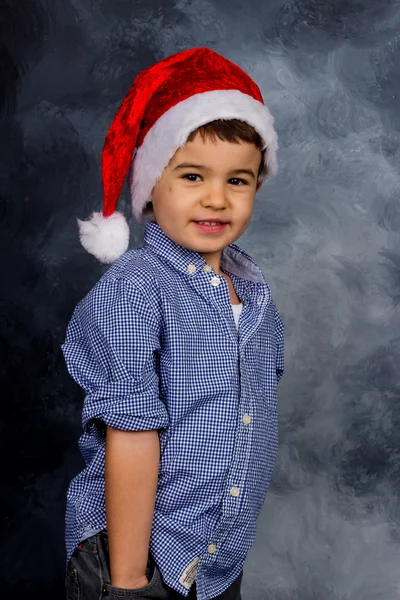Little boy with santa claus hat — Stock Photo, Image