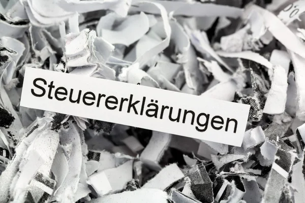 Shredded paper tax returns — Stock Photo, Image