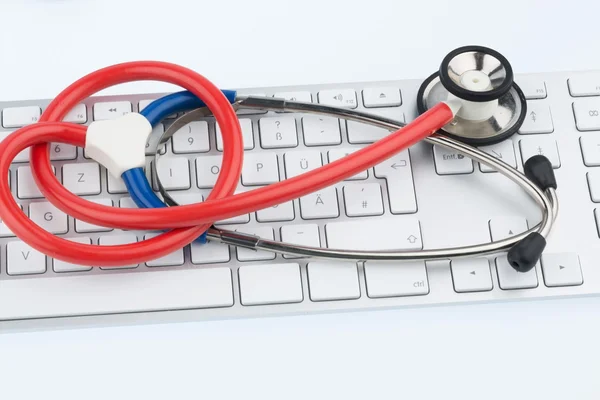 Stethoscope and keyboard — Stock Photo, Image