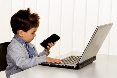little boy on laptop clipart