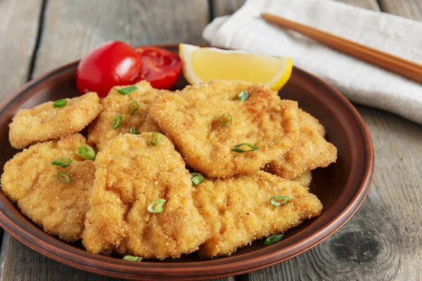 Ristet schnitzel chop escalope med citron tomat ris - Stock-foto