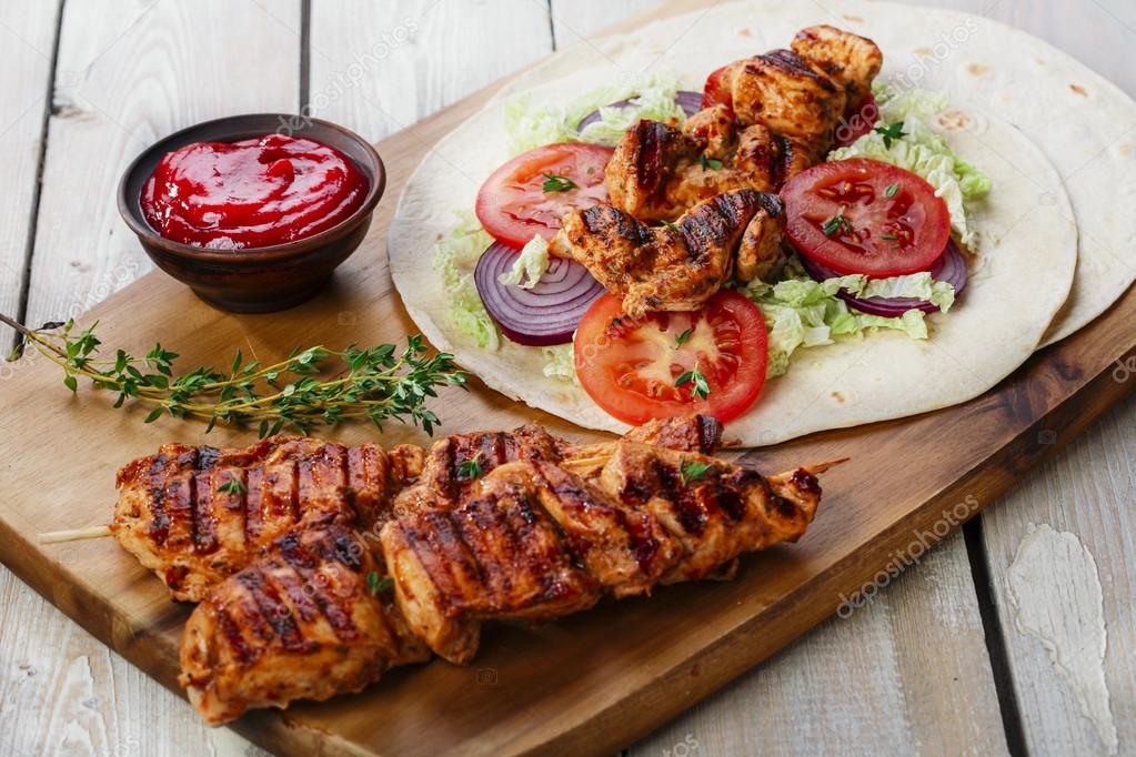 Grilled chicken shawarma with sauce Stock Photo by ©koss13 61003387