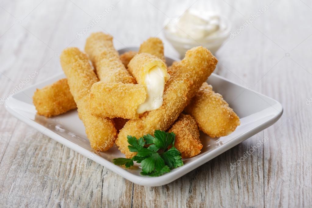 Fried mozzarella cheese sticks breaded Stock Photo by ©koss13 61875713