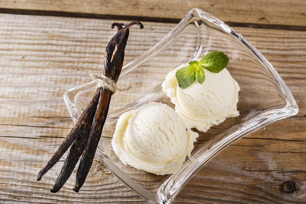 Ball of vanilla ice cream on a plate — Stock Photo, Image