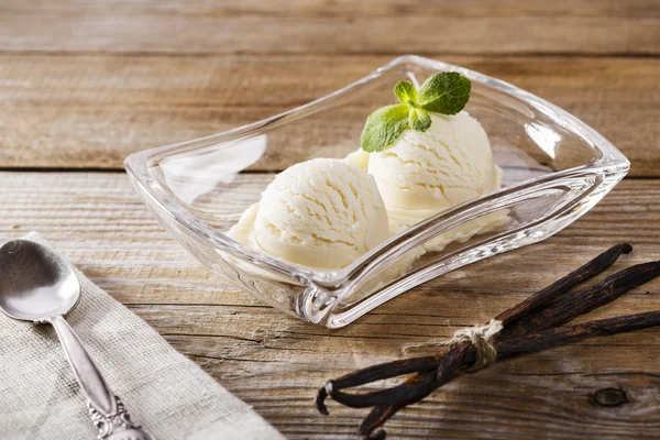 Ball of vanilla ice cream on a plate — Stock Photo, Image