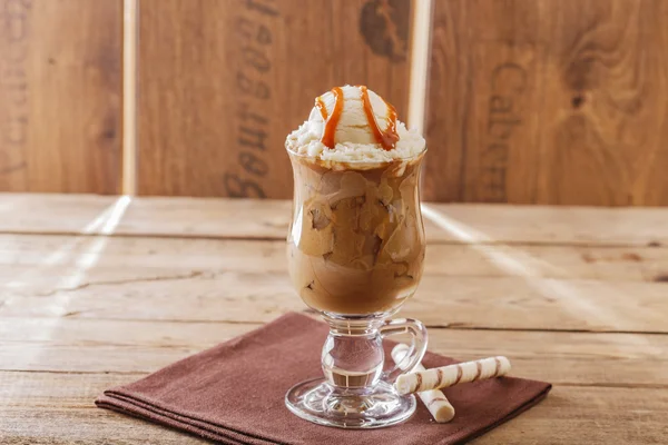 Iced coffee with milk and ice cream caramel — Stock Photo, Image