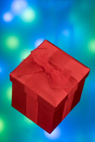 Красная Подарочная Коробка Красным Бантом Ленты Красочном Фоне — стоковое фото