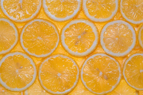 Ломтики Свежего Желтого Лимона Водой Качестве Текстурного Фона — стоковое фото