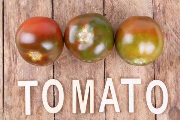 Kumato tomato — Stock Photo, Image