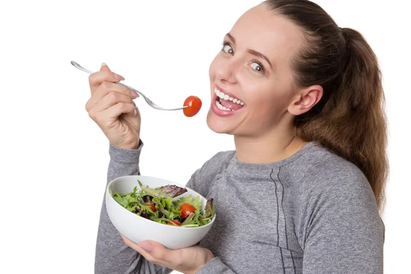 Γυναίκα καταλληλότητας τρώει σαλάτα — Φωτογραφία Αρχείου