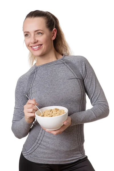 Femme mangeant des céréales — Photo