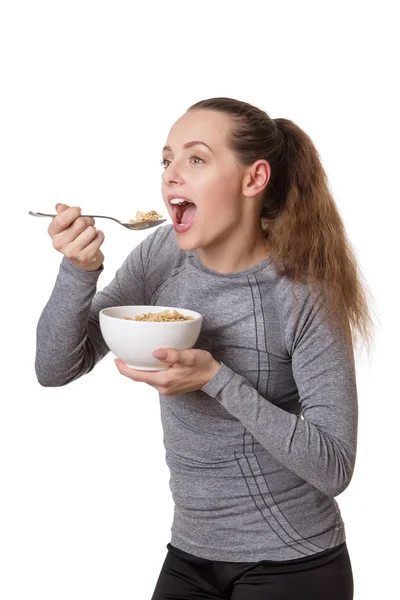 Mulher comendo cereais — Fotografia de Stock