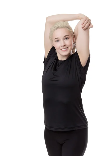 Fitness woman stretching arms — Stock Photo, Image