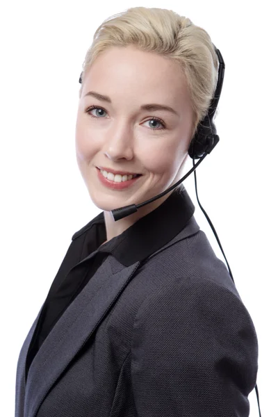 Mulher de negócios com fone de ouvido — Fotografia de Stock