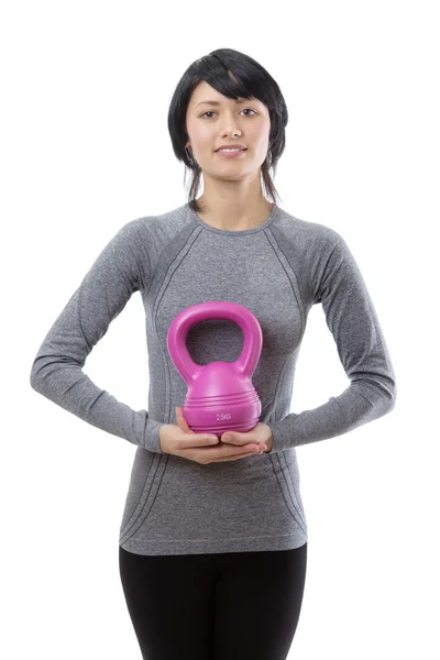 Fitness model with kettlebell — Stock Photo, Image