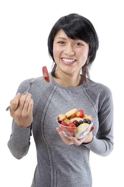 Fitness model with fruit salad — Stock Photo, Image